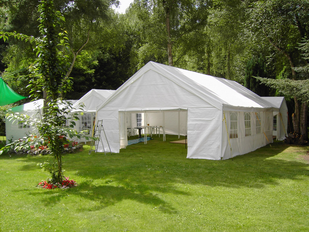 marquees linked together in garden Picture
